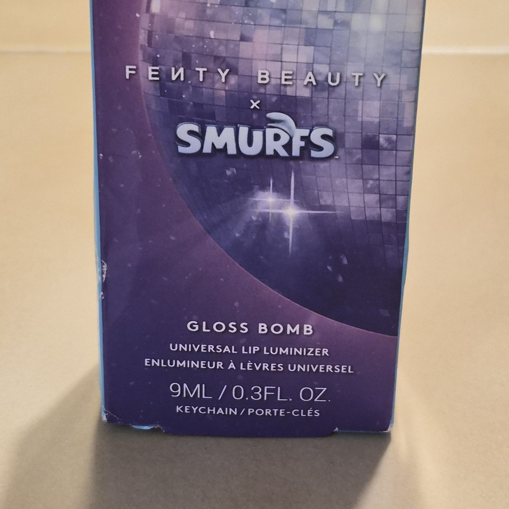 Fenty Beauty Smurfette Effect Gloss Bomb in Shimmering Purple